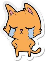 sticker of a crying cartoon cat vector