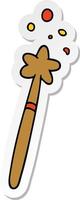 sticker cartoon doodle of a magic wand vector