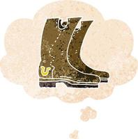 botas de vaquero de dibujos animados y burbuja de pensamiento en estilo retro texturizado vector