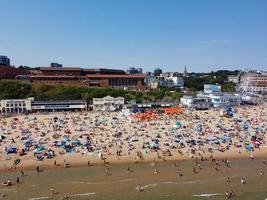 High Angle Sea View Beach Front with People at Bournemouth City of England UK, Aerial Footage of British Ocean photo