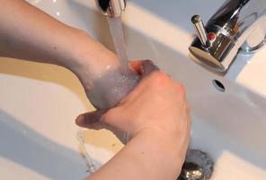 Cleaning and washing hands with soap prevention for outbreak of coronavirus covid-19 photo