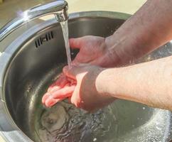 Cleaning and washing hands with soap prevention for outbreak of coronavirus covid-19 photo