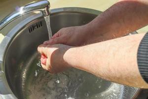 Cleaning and washing hands with soap prevention for outbreak of coronavirus covid-19 photo