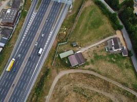 Aerial View and High Angle Footage of British Motorways Interchange of M1 Junction 11a at North Luton City of England UK. photo