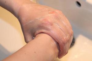 Cleaning and washing hands with soap prevention for outbreak of coronavirus covid-19 photo