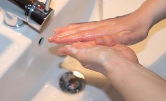 Cleaning and washing hands with soap prevention for outbreak of coronavirus covid-19 photo