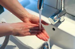 Cleaning and washing hands with soap prevention for outbreak of coronavirus covid-19 photo