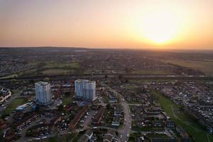 Gorgeous Aerial View of Luton City of England UK at Sunset Time, Colourful Clouds high angle footage taken by drone photo