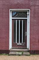 Front door of a small house in Germany. photo