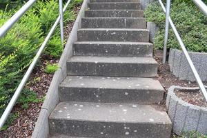 Different outdoor views on concrete, wooden and metal stairways. photo