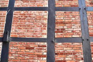 Beautiful texture of old vintage half timbered brick walls found in Germany. photo