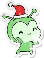 christmas distressed sticker cartoon of kawaii alien vector