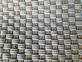 Detailed close up view on samples of cloth and fabrics in different colors found at a fabrics market photo