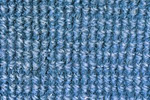 Detailed close up view on samples of cloth and fabrics in different colors found at a fabrics market photo