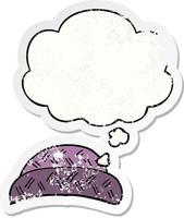 cartoon hat and thought bubble as a distressed worn sticker vector