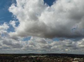 Most Beautiful Sky with Thick Clouds over British Town on a Hot Sunny Day photo