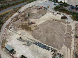 Aerial drone footage of Heavy Machinery is working to build up City Center of Luton England UK photo