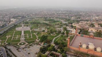 The Royal Mosque at Lahore Pakistan, Drone's High Angle View of Mughal era congregational mosque in Lahore, Punjab Pakistan photo