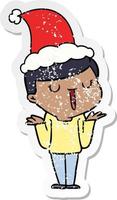 distressed sticker cartoon of a happy boy with no worries wearing santa hat vector
