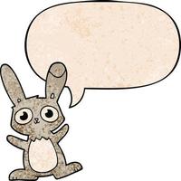 lindo conejo de dibujos animados y burbuja de habla en estilo de textura retro vector