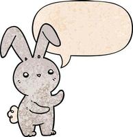 cute cartoon rabbit and speech bubble in retro texture style vector