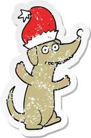 distressed sticker of a cute christmas cartoon dog vector