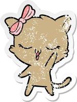 distressed sticker of a cartoon cat with bow on head waving vector