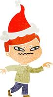 retro cartoon of a angry man pointing wearing santa hat vector