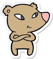 sticker of a cute cartoon bear with crossed arms vector