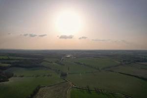 Gorgeous Aerial View of Luton City of England UK at Sunset Time, Colourful Clouds high angle footage taken by drone photo