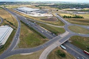 Aerial View and High Angle Footage of British Motorways Interchange of M1 Junction 11a at North Luton City of England UK. photo