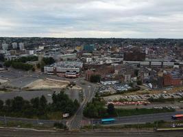 High Angle Footage of London Luton Town and Aerial view of Central Railway Station, Train Tracks of England UK photo