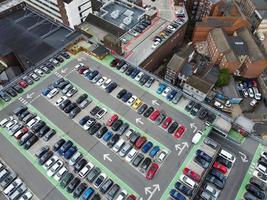 Aerial view high angle footage of modern car park in the building and roof top at City centre of Luton Town of England UK photo