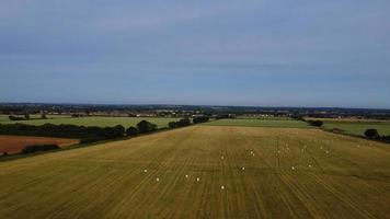 Aerial footage High Angle view of Green Energy natural Generators Sources of Wind turbines and solar panels Farms at England UK photo