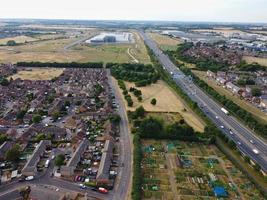 Aerial View of Luton City of England UK at Sunset Time, Colourful Clouds high angle footage taken by drone photo