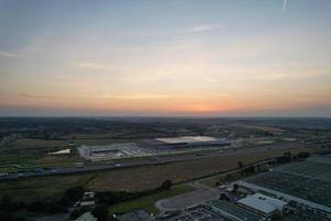 Gorgeous Aerial View of Luton City of England UK at Sunset Time, Colourful Clouds high angle footage taken by drone photo