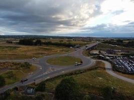 Aerial View and High Angle Footage of British Motorways Interchange of M1 Junction 11a at North Luton City of England UK. photo