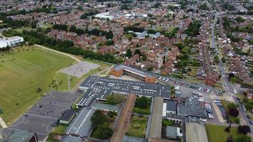 An Aerial Footage and High Angle view of Play Ground of a High School of boys at Luton Town of England, British Motorways and Highways photo