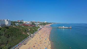 High Angle Sea View Beach Front with People at Bournemouth City of England UK, Aerial Footage of British Ocean photo