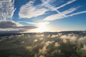 Aerial view of Clouds at Sunrise Morning time over Great Britain, drone's footage, Beautiful Morning with high winds and fast moving clouds photo