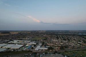 Gorgeous Aerial View of Luton City of England UK at Sunset Time, Colourful Clouds high angle footage taken by drone photo