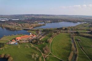 Gorgeous aerial footage and high angle view of British Lake and Roads with Water Birds photo