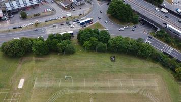 An Aerial Footage and High Angle view of Play Ground of a High School of boys at Luton Town of England, British Motorways and Highways photo