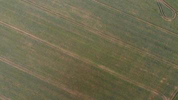 Aerial footage High Angle view of Green Energy natural Generators Sources of Wind turbines and solar panels Farms at England UK photo