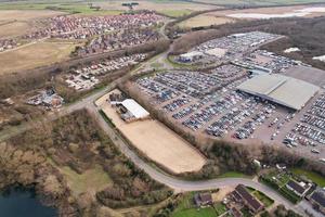 High Angle Aerial View of Massive Huge Car Park of Auctions of England photo