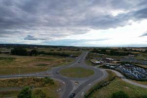Aerial View and High Angle Footage of British Motorways Interchange of M1 Junction 11a at North Luton City of England UK. photo