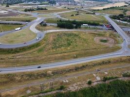 Aerial footage of Countryside fields at M1 J11 Motorways Luton England UK photo