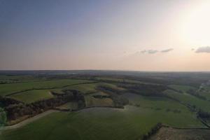 Gorgeous Aerial View of Luton City of England UK at Sunset Time, Colourful Clouds high angle footage taken by drone photo