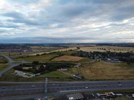 Aerial View and High Angle Footage of British Motorways Interchange of M1 Junction 11a at North Luton City of England UK. photo