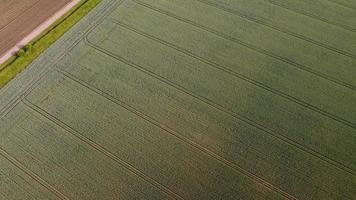 Aerial footage High Angle view of Green Energy natural Generators Sources of Wind turbines and solar panels Farms at England UK photo